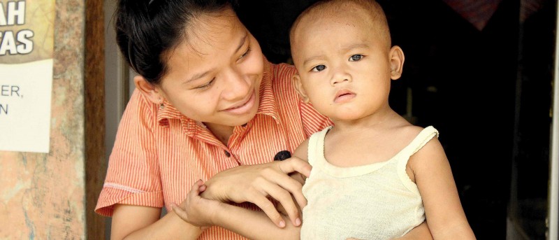 Moeder met zoon in Bekasi